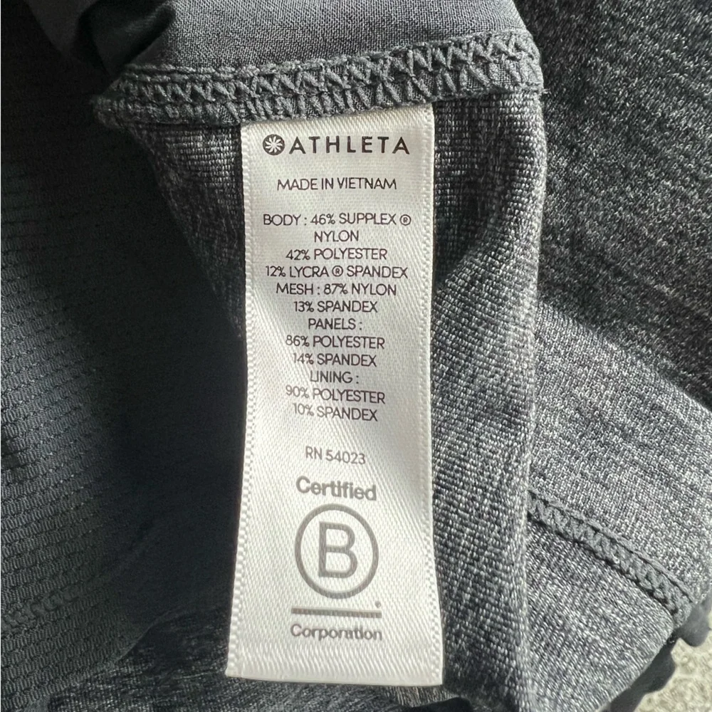 Athleta Excursion Hybrid Mid-Rise Tennis Skort in Dark Heathered Gray Size XS